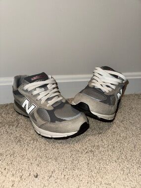 New Balance Kids Gray and White Sneakers - Classic Athletic Style